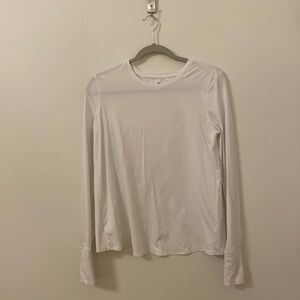White athleta top with the slit back and thumb holes on the sleeves